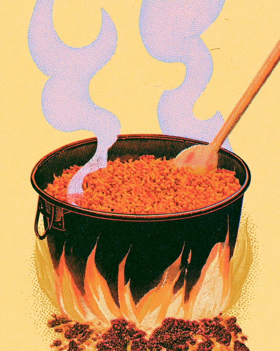 The jollof pot over open flame